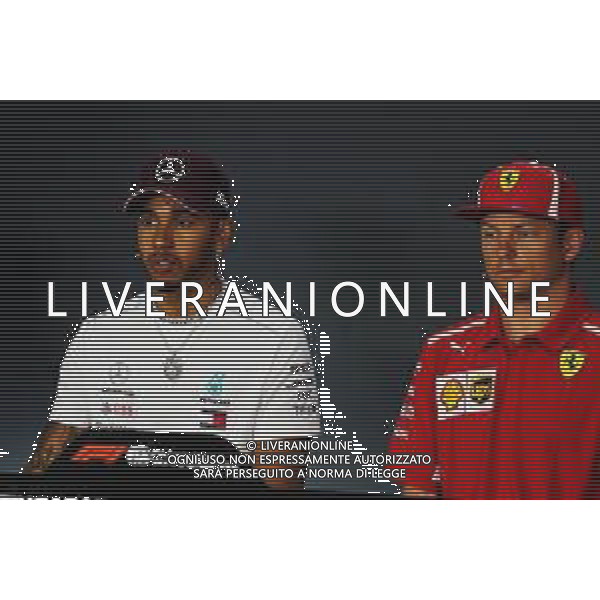 (L to R): Lewis Hamilton (GBR) Mercedes AMG F1 and Kimi Raikkonen (FIN) Ferrari in the FIA Press Conference. 13.09.2018. Formula 1 World Championship, Rd 15, Singapore Grand Prix, Marina Bay Street Circuit, Singapore, Preparation Day. AG ALDO LIVERANI SAS-ONLY ITALY