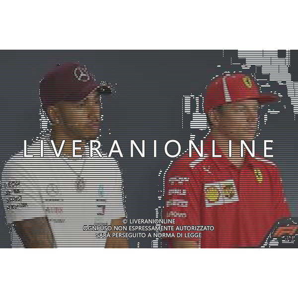 Lewis Hamilton (GBR) Mercedes AMG F1 and Kimi Raikkonen (FIN) Scuderia Ferrari 13.09.2018. Formula 1 World Championship, Rd 15, Singapore Grand Prix, Marina Bay Street Circuit, Singapore, Preparation Day. AG ALDO LIVERANI SAS-ONLY ITALY