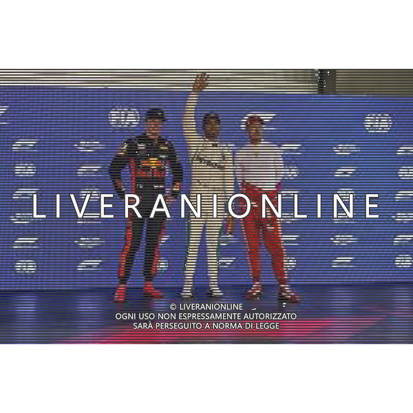 Qualifying top three in parc ferme (L to R): Max Verstappen (NLD) Red Bull Racing, second; Lewis Hamilton (GBR) Mercedes AMG F1, pole position; Sebastian Vettel (GER) Ferrari, third. 15.09.2018. Formula 1 World Championship, Rd 15, Singapore Grand Prix, Marina Bay Street Circuit, Singapore, Qualifying Day. / AGENZIA ALDO LIVERANI SAS - ITALY ONLY EDITORIAL USE ONLY - F1 GP Singapore Prove Ufficiali Qualifiche 15.09.2018