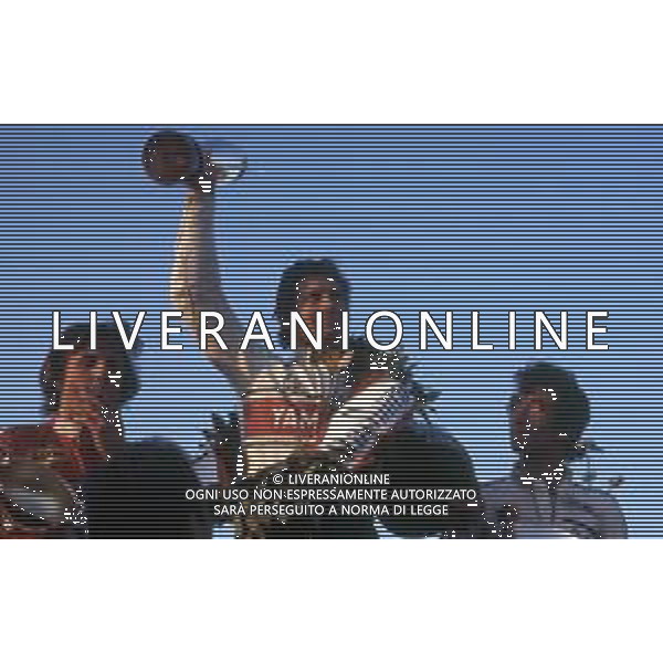 GIACOMO AGOSTINI, pilota motociclistico italiano - RETROSPETTIVA nella foto sul podio su Yamaha 500 con Phillip William Read ©ARCHIVIO / AGENZIA ALDO LIVERANI SAS