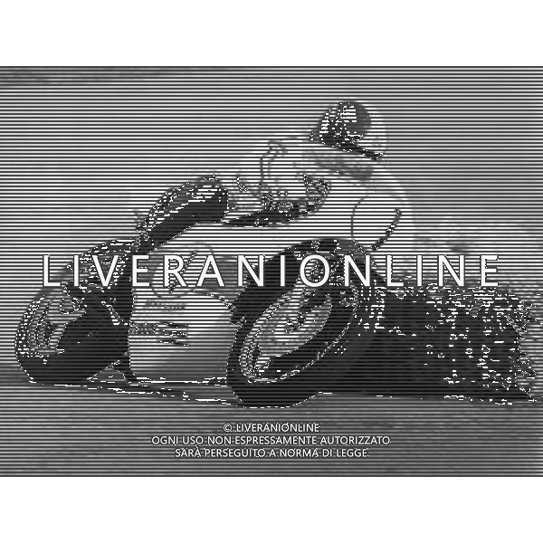 Giacomo Agostini su Yamaha foto archivio Giovanni Liverani/AG.Aldo liverani GIACOMO AGOSTINI, pilota motociclistico italiano - RETROSPETTIVA ©ARCHIVIO / AGENZIA ALDO LIVERANI SAS