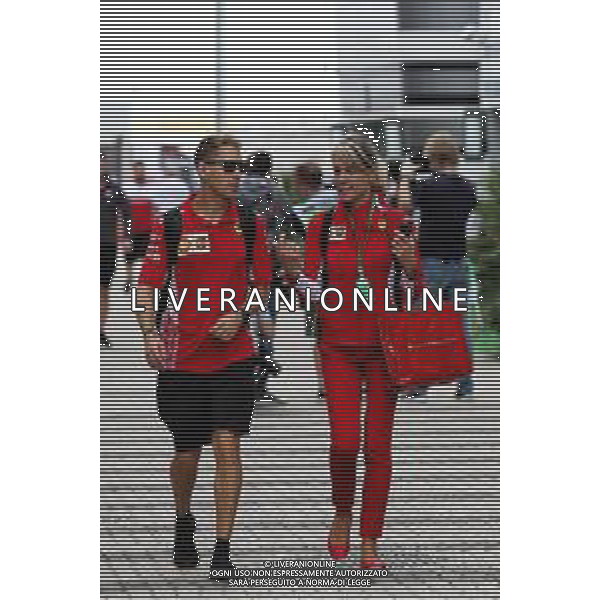 Sebastian Vettel (GER) Ferrari with Britta Roeske (AUT) Ferrari Press Officer. 28.09.2018. Formula 1 World Championship, Rd 16, Russian Grand Prix, Sochi Autodrom, Sochi, Russia, Practice Day. AG ALDO LIVERANI SAS-ONLY ITALY