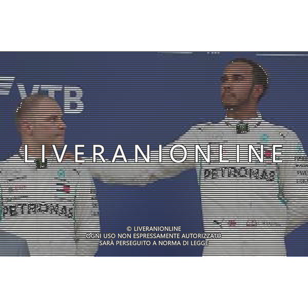 Valtteri Bottas (FIN) Mercedes AMG F1 and 1st place Lewis Hamilton (GBR) Mercedes AMG F1 W09. 30.09.2018. Formula 1 World Championship, Rd 16, Russian Grand Prix, Sochi Autodrom, Sochi, Russia, Race Day. / AGENZIA ALDO LIVERANI SAS - ITALY ONLY EDITORIAL USE ONLY