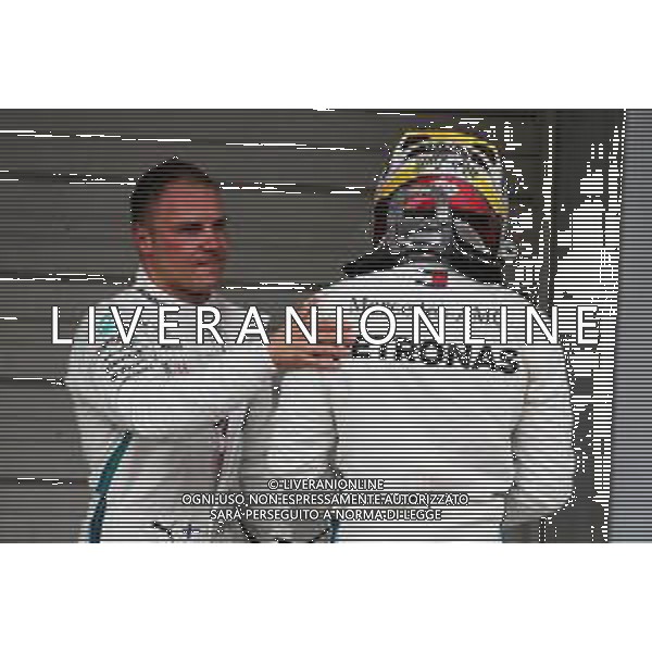 (L to R): Second placed Valtteri Bottas (FIN) Mercedes AMG F1 congratulates his team mate Lewis Hamilton (GBR) Mercedes AMG F1 on his 80th pole position in qualifying parc ferme. 06.10.2018. Formula 1 World Championship, Rd 17, Japanese Grand Prix, Suzuka, Japan, Qualifying Day. AG ALDO LIVERANI SAS-ONLY ITALY