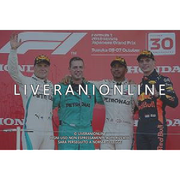 1st place Lewis Hamilton (GBR) Mercedes AMG F1 W09 with 2nd place Valtteri Bottas (FIN) Mercedes AMG F1 and 3rd place Max Verstappen (NLD) Red Bull Racing RB14. 07.10.2018. Formula 1 World Championship, Rd 17, Japanese Grand Prix, Suzuka, Japan, Race Day. / AGENZIA ALDO LIVERANI SAS - ITALY ONLY EDITORIAL USE ONLY - F1 Gp GIAPPONE GARA 07.10.2018.