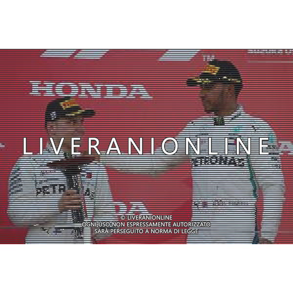 Valtteri Bottas (FIN) Mercedes AMG F1 and 1st place Lewis Hamilton (GBR) Mercedes AMG F1 W09. 07.10.2018. Formula 1 World Championship, Rd 17, Japanese Grand Prix, Suzuka, Japan, Race Day. / AGENZIA ALDO LIVERANI SAS - ITALY ONLY EDITORIAL USE ONLY - F1 Gp GIAPPONE GARA 07.10.2018.