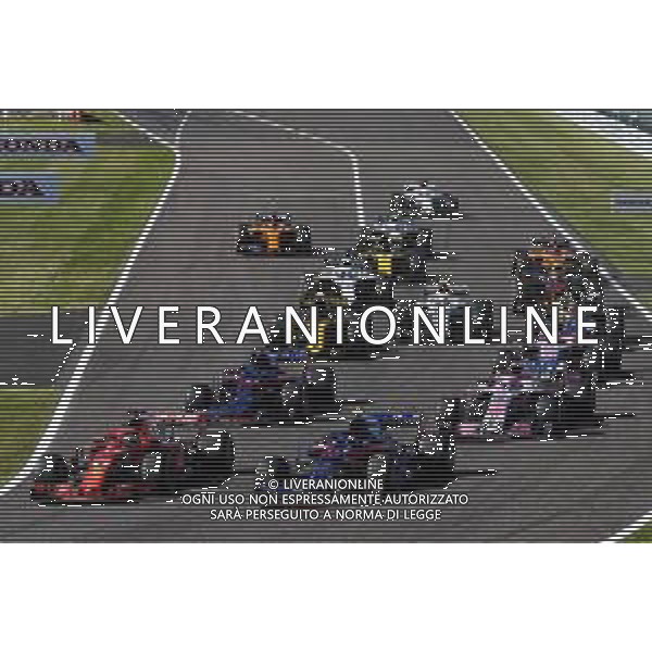 Sebastian Vettel (GER) Ferrari SF71H and Pierre Gasly (FRA) Scuderia Toro Rosso STR13 at the start of the race. 07.10.2018. Formula 1 World Championship, Rd 17, Japanese Grand Prix, Suzuka, Japan, Race Day. / AGENZIA ALDO LIVERANI SAS - ITALY ONLY EDITORIAL USE ONLY - F1 Gp GIAPPONE GARA 07.10.2018.
