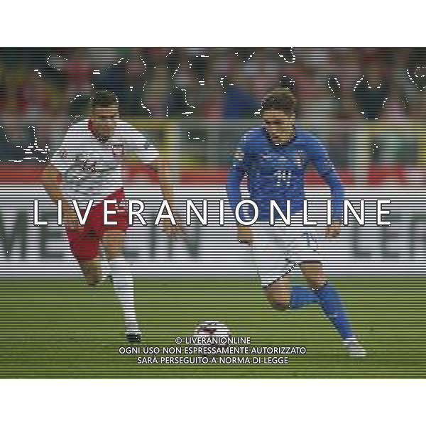 CHORZOW STADION SLASKI 14.10.2018 LIGA NARODOW PILKA NOZNA POLSKA (BIALO-CZERWONE) - WLOCHY (NIEBIESKO-BIALE) NZ Arkadiiusz Reca , Federico Chiesa . FOT TOMASZ WANTULA / NEWSPIX.PL CHORZOW 14.10.2018 FOOTBALL MEN\'S LEAGUE OF NATIONS POLAND - ITALY TOMASZ WANTULA / NEWSPIX.PL --- Newspix.pl / AGENZIA ALDO LIVERANI SAS - ITALY ONLY EDITORIAL USE ONLY - Polonia - Italia UEFA Nations League 14.10.2018