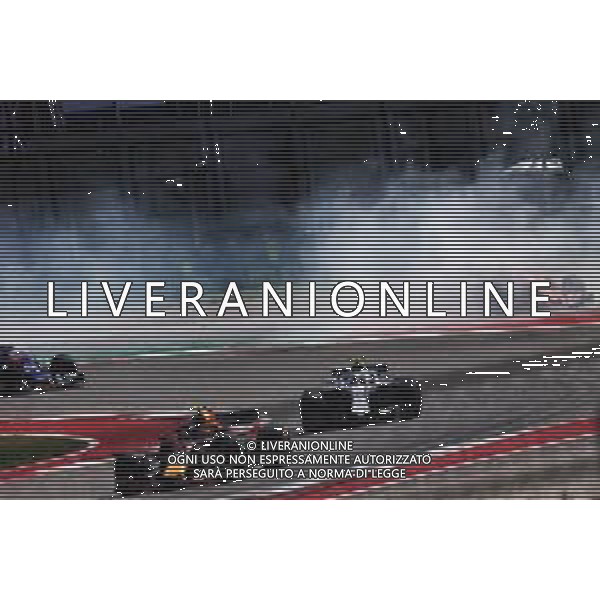 Sebastian Vettel (GER) Ferrari SF71H spins at the start of the race. 21.10.2018. Formula 1 World Championship, Rd 18, United States Grand Prix, Austin, Texas, USA, Race Day. / AGENZIA ALDO LIVERANI SAS - ITALY ONLY EDITORIAL USE ONLY