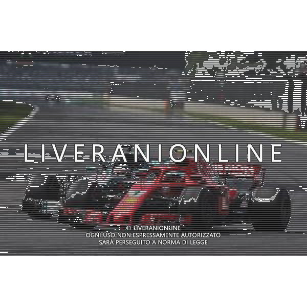 Kimi Raikkonen (FIN) Ferrari SF71H and Lewis Hamilton (GBR) Mercedes AMG F1 W09 battle for position. 28.10.2018. Formula 1 World Championship, Rd 19, Mexican Grand Prix, Mexico City, Mexico, Race Day. / AGENZIA ALDO LIVERANI SAS - ITALY ONLY EDITORIAL USE ONLY - GP F1 MESSICO GARA 28.10.2018