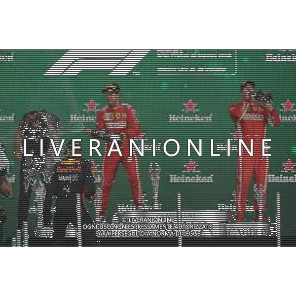 1st place Max Verstappen (NLD) Red Bull Racing RB14, 2nd place Sebastian Vettel (GER) Ferrari SF71H and 3rd place Kimi Raikkonen (FIN) Ferrari SF71H. 28.10.2018. Formula 1 World Championship, Rd 19, Mexican Grand Prix, Mexico City, Mexico, Race Day. / AGENZIA ALDO LIVERANI SAS - ITALY ONLY EDITORIAL USE ONLY - GP F1 MESSICO GARA 28.10.2018