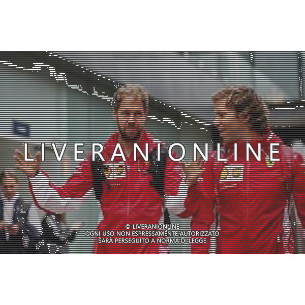 (L to R): Sebastian Vettel (GER) Ferrari with Antti Kontsas (FIN) Personal Trainer. 09.11.2018. Formula 1 World Championship, Rd 20, Brazilian Grand Prix, Sao Paulo, Brazil, Practice Day. AG ALDO LIVERANI SAS-ONLY ITALY
