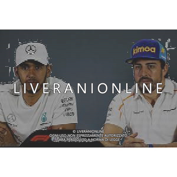 (L to R): Lewis Hamilton (GBR) Mercedes AMG F1 and Fernando Alonso (ESP) McLaren in the FIA Press Conference. 22.11.2018. Formula 1 World Championship, Rd 21, Abu Dhabi Grand Prix, Yas Marina Circuit, Abu Dhabi, Preparation Day. AG ALDO LIVERANI SAS-ONLY ITALY