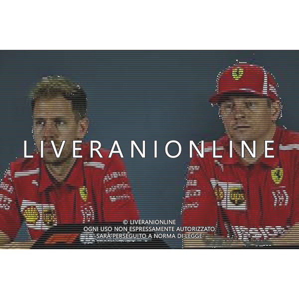 (L to R): Sebastian Vettel (GER) Ferrari and Kimi Raikkonen (FIN) Ferrari in the FIA Press Conference. 22.11.2018. Formula 1 World Championship, Rd 21, Abu Dhabi Grand Prix, Yas Marina Circuit, Abu Dhabi, Preparation Day. AG ALDO LIVERANI SAS-ONLY ITALY