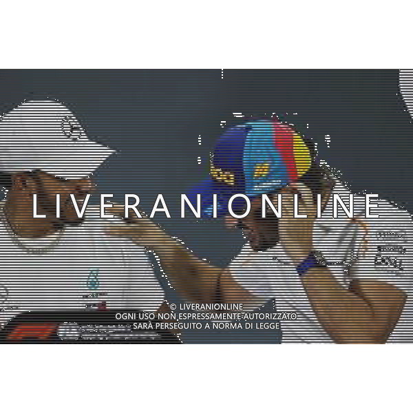 (L to R): Lewis Hamilton (GBR) Mercedes AMG F1 and Fernando Alonso (ESP) McLaren in the FIA Press Conference. 22.11.2018. Formula 1 World Championship, Rd 21, Abu Dhabi Grand Prix, Yas Marina Circuit, Abu Dhabi, Preparation Day. AG ALDO LIVERANI SAS-ONLY ITALY