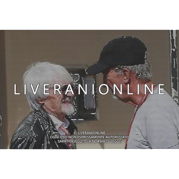 (L to R): Bernie Ecclestone (GBR) with Eddie Jordan (IRE). 23.11.2018. Formula 1 World Championship, Rd 21, Abu Dhabi Grand Prix, Yas Marina Circuit, Abu Dhabi, Practice Day. AG ALDO LIVERANI SAS-ONLY ITALY