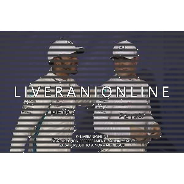 Lewis Hamilton (GBR) Mercedes AMG F1 W09 and Valtteri Bottas (FIN) Mercedes AMG F1. 24.11.2018. Formula 1 World Championship, Rd 21, Abu Dhabi Grand Prix, Yas Marina Circuit, Abu Dhabi, Qualifying Day. AG ALDO LIVERANI SAS-ONLY ITALY