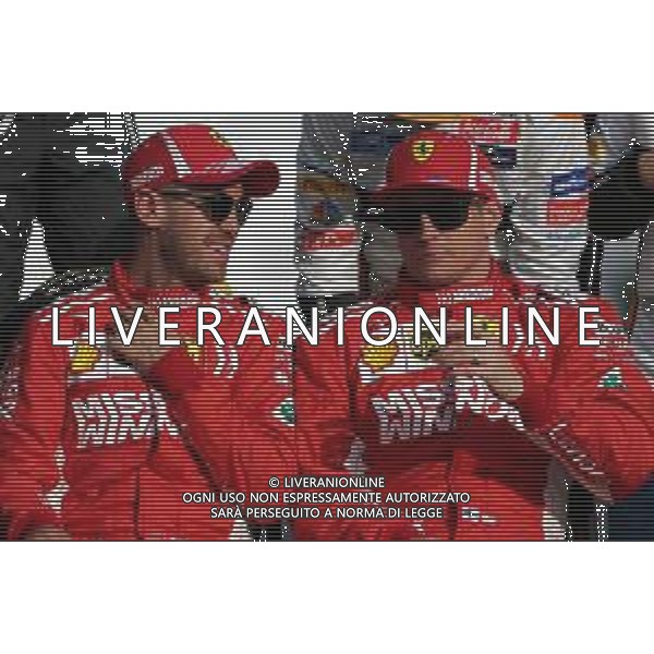 Sebastian Vettel (GER) Scuderia Ferrari and Kimi Raikkonen (FIN) Scuderia Ferrari 25.11.2018. Formula 1 World Championship, Rd 21, Abu Dhabi Grand Prix, Yas Marina Circuit, Abu Dhabi, Race Day. AG ALDO LIVERANI SAS-ONLY ITALY