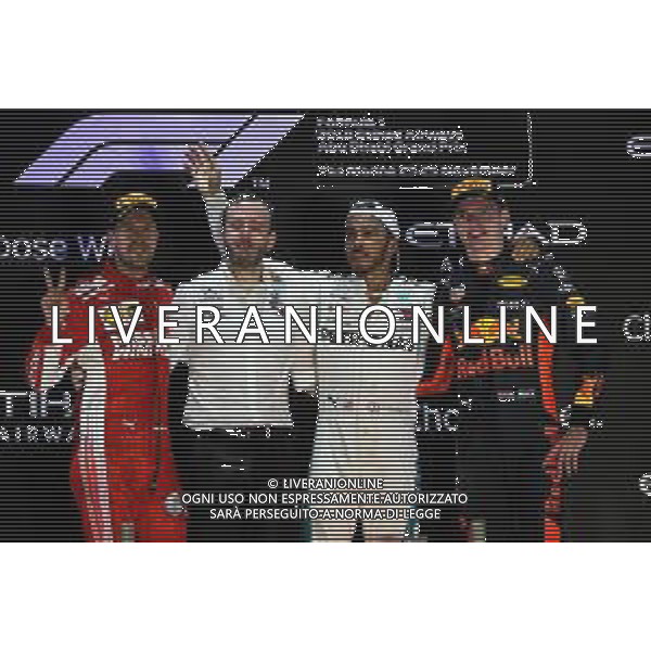 The podium (L to R): Sebastian Vettel (GER) Ferrari, second; Bradley Lord (GBR) Mercedes AMG F1 Communications Manager; Lewis Hamilton (GBR) Mercedes AMG F1, race winner; Max Verstappen (NLD) Red Bull Racing, third. 25.11.2018. Formula 1 World Championship, Rd 21, Abu Dhabi Grand Prix, Yas Marina Circuit, Abu Dhabi, Race Day. AG ALDO LIVERANI SAS-ONLY ITALY
