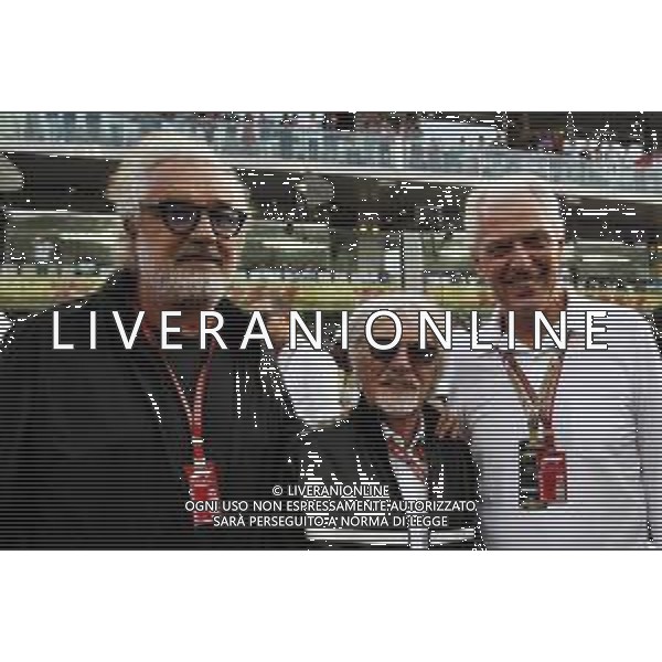 (L to R): Flavio Briatore (ITA) with Bernie Ecclestone (GBR) and Marco Tronchetti Provera (ITA) Pirelli Chairman on the grid. 25.11.2018. Formula 1 World Championship, Rd 21, Abu Dhabi Grand Prix, Yas Marina Circuit, Abu Dhabi, Race Day. - www.xpbimages.com, EMail: requests@xpbimages.com - copy of publication required for printed pictures. Every used picture is fee-liable. © Copyright: Photo4 / XPB Images AG ALDO LIVERANI SAS-ONLY ITALY