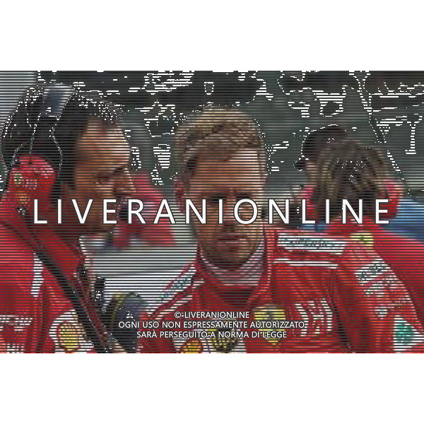 Sebastian Vettel (GER) Ferrari on the grid. 25.11.2018. Formula 1 World Championship, Rd 21, Abu Dhabi Grand Prix, Yas Marina Circuit, Abu Dhabi, Race Day. AG ALDO LIVERANI SAS-ONLY ITALY