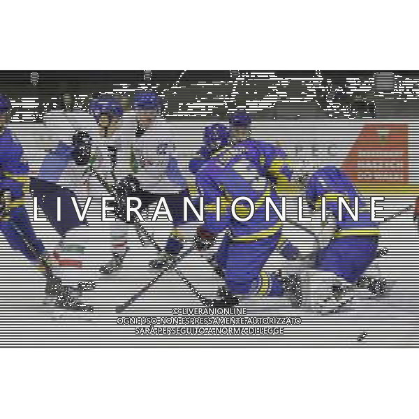 TYCHY 12.12.2018 SPORT HOKEJ NA LODZIE MISTRZOSTWA SWIATA U20 DYWIZJI 1B ICE HOCKEY U20 WORLD CHAMPIONSHIP DIVISION I - GROUP B UKRAINA - WLOCHY UKRAINE - ITALY NZ. MAXIMILIAN LEITNER (ITA) SERHI LOHACH (UKR) ARTUR OHANDZHANYAN (UKR) FOT. MICHAL CHWIEDUK / FOKUSMEDIA/NEWSPIX.PL --- Newspix.pl AG ALDO LIVERANI SAS