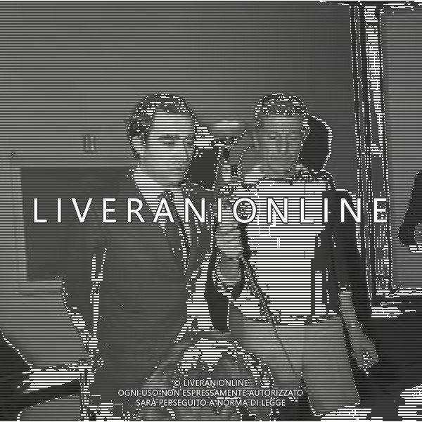 1974 RIENTRO DELLA NAZIONALE ITALIANA DAI CAMPIONATI DEL MONDO GERMANIA 74 CONFERENZA STAMPA DI ITALO ALLODI E FRANCO CARRARO NELLA FOTO FRANCO CARRARO INTERVISTATO DA ALFREDO PIGNA AG ALDO LIVERANI SAS