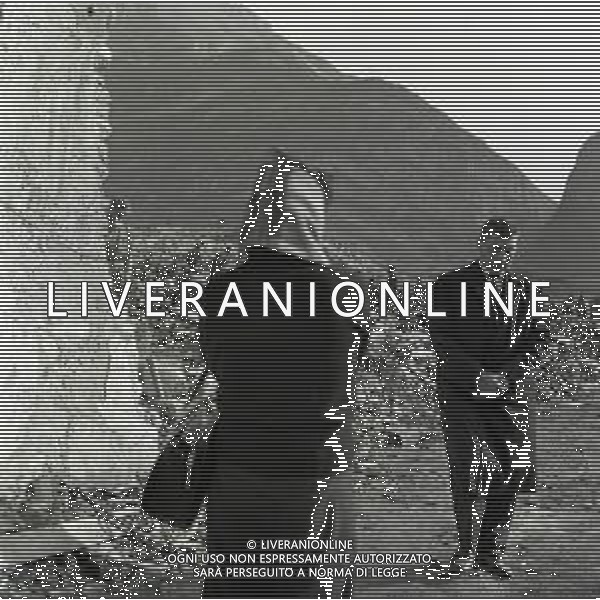 10-10-1963 LONGARONE - DISASTRO DIGA DEL VAJONT Il disastro del Vajont è stato un disastro ambientale ed umano. Si è verificato la sera del 9 ottobre 1963, nel neo-bacino idroelettrico artificiale del torrente Vajont (al confine tra Friuli e Veneto), dovuto alla caduta di una frana dal soprastante pendio del Monte Toc nelle acque del bacino alpino realizzato con l\'omonima diga; la conseguente tracimazione dell\'acqua contenuta nell\'invaso, con effetto di dilavamento delle sponde del lago, coinvolse prima Erto e Casso, paesi vicini alla riva del lago dopo la costruzione della diga, mentre il superamento della diga da parte dell\'onda generata provocò l\'inondazione e la distruzione degli abitati del fondovalle veneto, tra cui Longarone, e la morte di 1917 persone. AG ALDO LIVERANI SAS