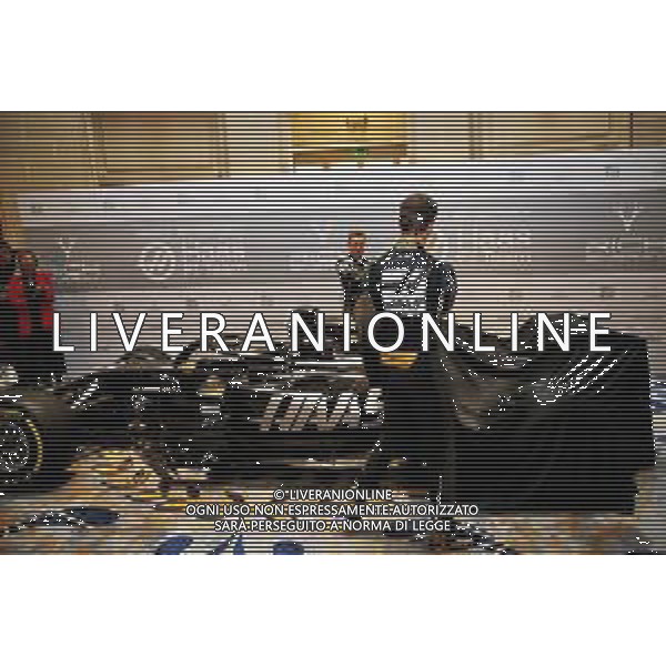 Romain Grosjean (FRA) Haas F1 Team and Kevin Magnussen (DEN) Haas F1 Team unveil the new livery on the Haas VF-18. 07.02.2019. Haas F1 Team Livery Unveil, The Royal Automobile Club, London, England. AG ALDO LIVERANI SAS-ONLY ITALY
