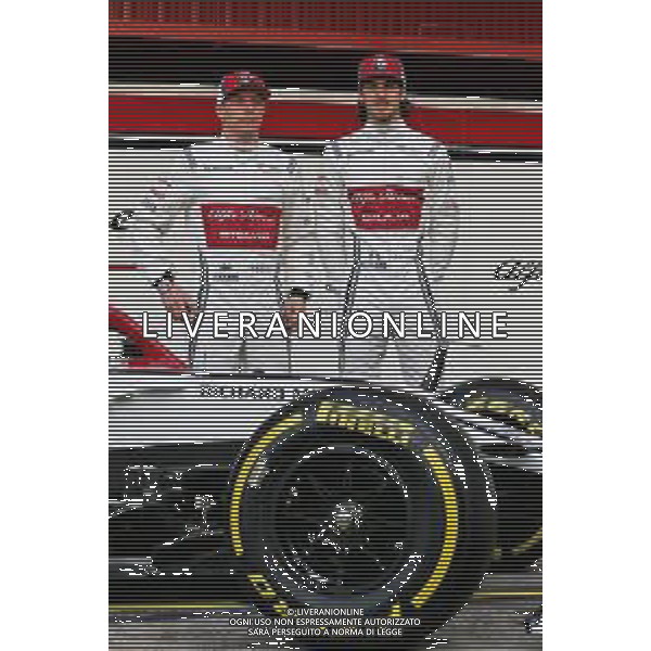 (L to R): Kimi Raikkonen (FIN) Alfa Romeo Racing with team mate Antonio Giovinazzi (ITA) Alfa Romeo Racing. 18.02.2019. Formula One Testing, Day One, Barcelona, Spain. Monday. / AGENZIA ALDO LIVERANI SAS - ITALY ONLY EDITORIAL USE ONLY - F1 Testing, Day One, Barcellona, Spagna 18.02.2019