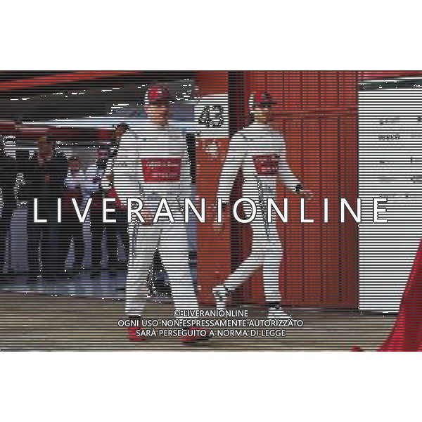 (L to R): Kimi Raikkonen (FIN) Alfa Romeo Racing with Antonio Giovinazzi (ITA) Alfa Romeo Racing. 18.02.2019. Formula One Testing, Day One, Barcelona, Spain. Monday. / AGENZIA ALDO LIVERANI SAS - ITALY ONLY EDITORIAL USE ONLY - F1 Testing, Day One, Barcellona, Spagna 18.02.2019