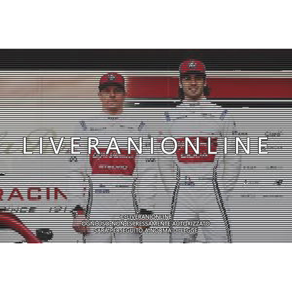 (L to R): Kimi Raikkonen (FIN) Alfa Romeo Racing with Antonio Giovinazzi (ITA) Alfa Romeo Racing. 18.02.2019. Formula One Testing, Day One, Barcelona, Spain. Monday. / AGENZIA ALDO LIVERANI SAS - ITALY ONLY EDITORIAL USE ONLY - F1 Testing, Day One, Barcellona, Spagna 18.02.2019