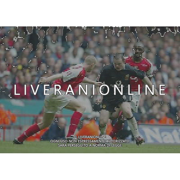 Arsenal FC - Manchester United FC-FA Cup Final in Cardiff at the Millennium stadium - 21/05/2005 nella foto Wayne Rooney e Philippe Senseros ph by Marcello Pozzetti : ©IPS Photo Agency/Agenzia Aldo liverani