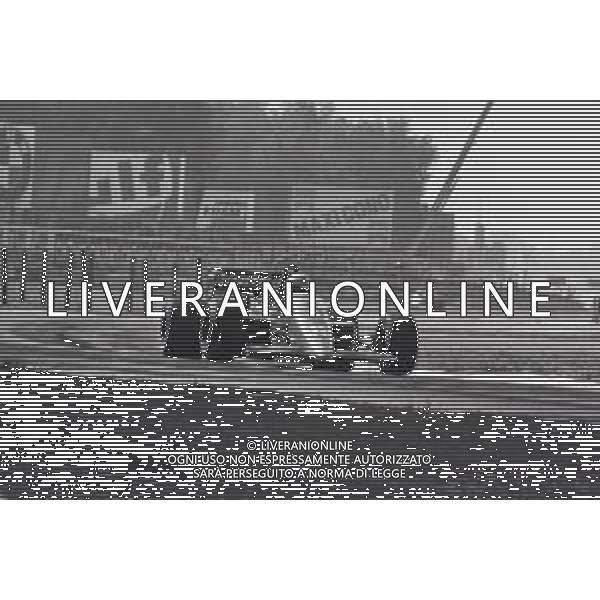 RETROSPETTIVA ALAN JONES PILOTA F1 NELLA FOTO ALAN JONES GP MONZA F1 1985 AG ALDO LIVERANI SAS