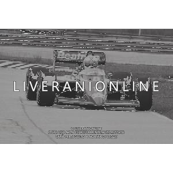 RETROSPETTIVA ALAN JONES PILOTA F1 NELLA FOTO ALAN JONES GP MONZA F1 1986-87 AG ALDO LIVERANI SAS