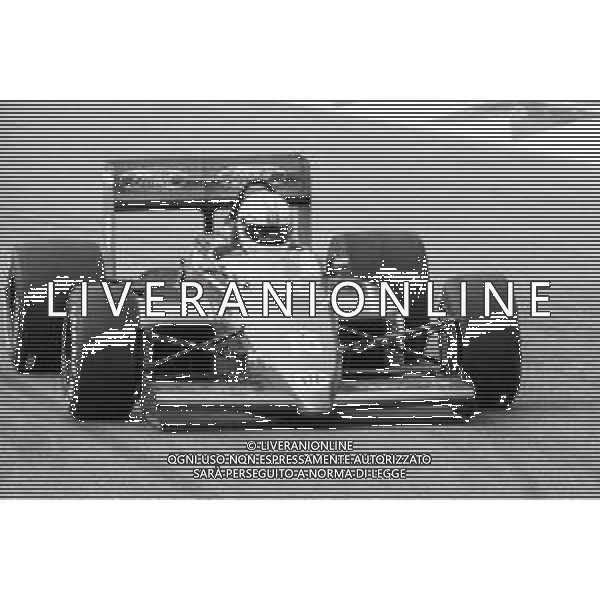 RETROSPETTIVA ALAN JONES PILOTA F1 NELLA FOTO ALAN JONES GP MONZA F1 1986-87 AG ALDO LIVERANI SAS