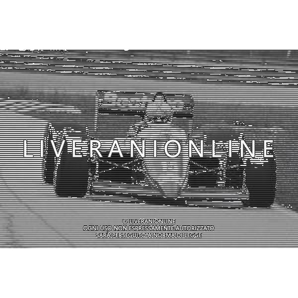RETROSPETTIVA ALAN JONES PILOTA F1 NELLA FOTO ALAN JONES GP MONZA F1 1986-87 AG ALDO LIVERANI SAS