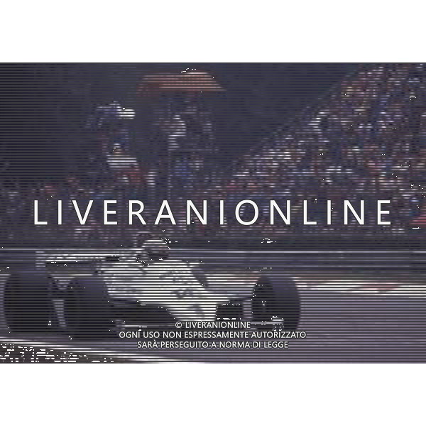 RETROSPETTIVA ALAN JONES PILOTA F1 NELLA FOTO ALAN JONES 1979 AG ALDO LIVERANI SAS