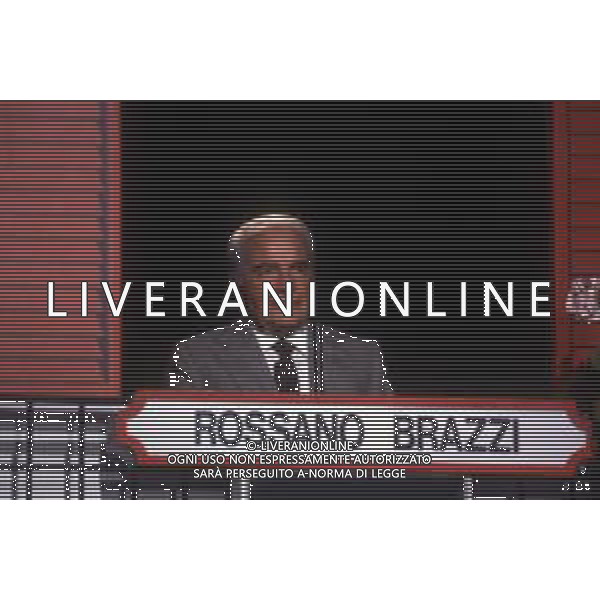 RETROSPETTIVA ROSSANO BRAZZI ATTORE E REGISTA NELLA FOTO ROSSANO BRAZZI NELLA TRASMISSIONE IL GIOCO DEI 9 NEL 1990 AG ALDO LIVERANI SAS