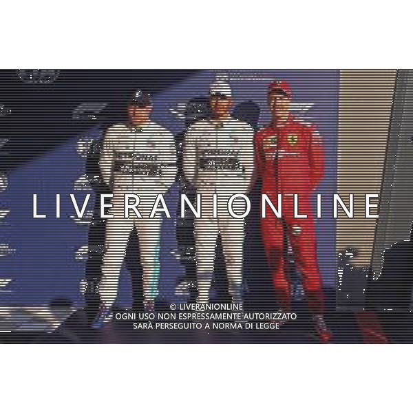 Qualifying top three in parc ferme (L to R): Valtteri Bottas (FIN) Mercedes AMG F1, second; Lewis Hamilton (GBR) Mercedes AMG F1, pole position; Sebastian Vettel (GER) Ferrari, third. 16.03.2019. Formula 1 World Championship, Rd 1, Australian Grand Prix, Albert Park, Melbourne, Australia, Qualifying Day. AG ALDO LIVERANI SAS-ONLY ITALY