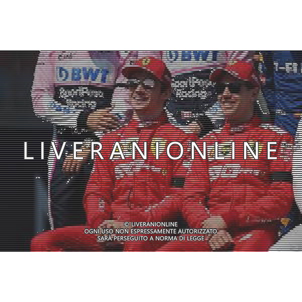 (L to R): Charles Leclerc (MON) Ferrari and Sebastian Vettel (GER) Ferrari at the start of season group photograph. 17.03.2019. Formula 1 World Championship, Rd 1, Australian Grand Prix, Albert Park, Melbourne, Australia, Race Day. / AGENZIA ALDO LIVERANI SAS - ITALY ONLY EDITORIAL USE ONLY - F1 GP AUSTRALIA MELBOURNE GARA 17.03.2019.