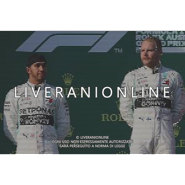 2nd place Lewis Hamilton (GBR) Mercedes AMG F1 with 1st place Valtteri Bottas (FIN) Mercedes AMG F1. 17.03.2019. Formula 1 World Championship, Rd 1, Australian Grand Prix, Albert Park, Melbourne, Australia, Race Day. / AGENZIA ALDO LIVERANI SAS - ITALY ONLY EDITORIAL USE ONLY - F1 GP AUSTRALIA MELBOURNE GARA 17.03.2019.