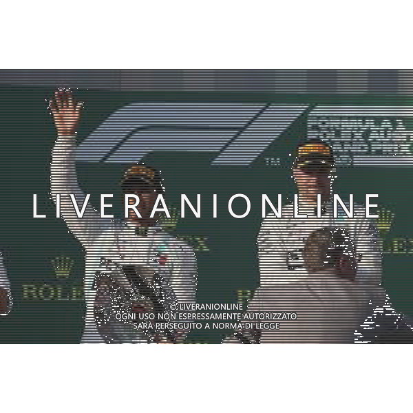 2nd place Lewis Hamilton (GBR) Mercedes AMG F1 with 1st place Valtteri Bottas (FIN) Mercedes AMG F1. 17.03.2019. Formula 1 World Championship, Rd 1, Australian Grand Prix, Albert Park, Melbourne, Australia, Race Day. / AGENZIA ALDO LIVERANI SAS - ITALY ONLY EDITORIAL USE ONLY - F1 GP AUSTRALIA MELBOURNE GARA 17.03.2019.