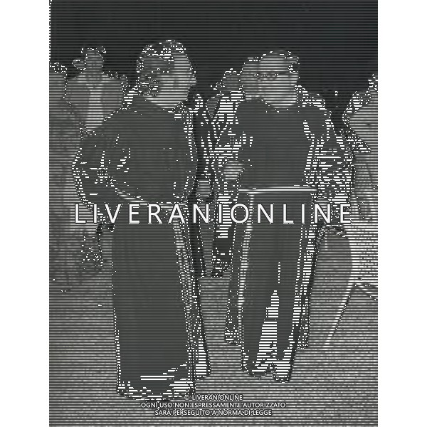 RETROSPETTIVA PADRE ELIGIO Padre Eligio, pseudonimo di Angelo Gelmini, affettuosamente Peligio (Pozzuolo Martesana, 17 luglio 1931), è un presbitero italiano. NELLA FOTO PADRE ELIGIO AG ALDO LIVERANI SAS