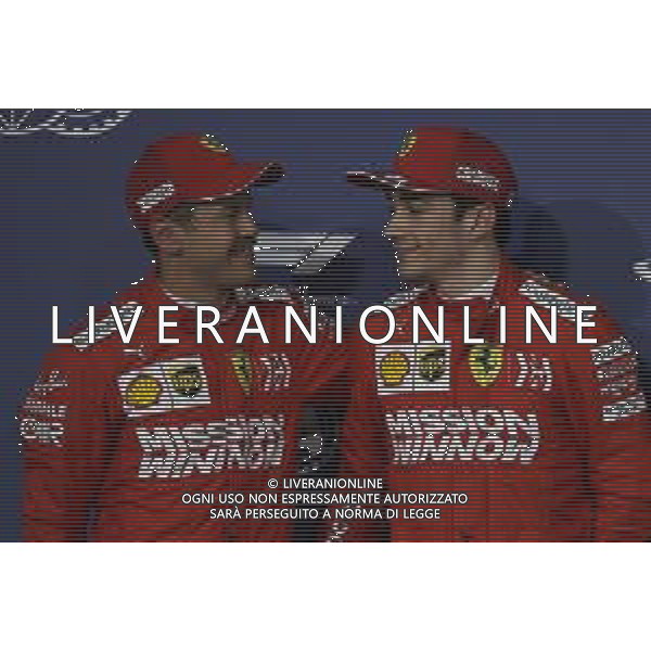 Sebastian Vettel (GER) Ferrari SF90 with Charles Leclerc (MON) Ferrari who takes his 1st pole position. 30.03.2019. Formula 1 World Championship, Rd 2, Bahrain Grand Prix, Sakhir, Bahrain, Qualifying Day. AG ALDO LIVERANI SAS-ONLY ITALY