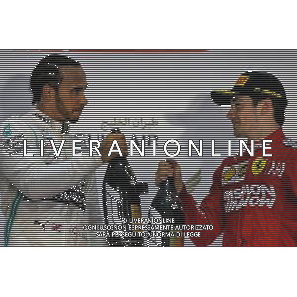 (L to R): Race winner Lewis Hamilton (GBR) Mercedes AMG F1 celebrates on the podium with third placed Charles Leclerc (MON) Ferrari. AG ALDO LIVERANI SAS-ONLY ITALY