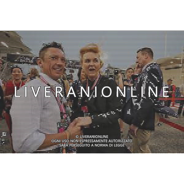 (L to R): Frankie Dettori (ITA) Jockey with Sarah Ferguson (GBR) Duchess of York, on the grid. 31.03.2019. Formula 1 World Championship, Rd 2, Bahrain Grand Prix, Sakhir, Bahrain, Race Day. AG ALDO LIVERANI SAS-ONLY ITALY
