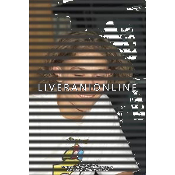 01-09-1997 MILANO REDAZIONE DELLA GAZZETTA DELLO SPORT IN VIA SOLFERINO 28 VISITA DEL CAMPIONE DI MOTOCICLISMO VALENTINO ROSSI NELLA FOTO VALENTINO ROSSI  AG ALDO LIVERANI SAS  