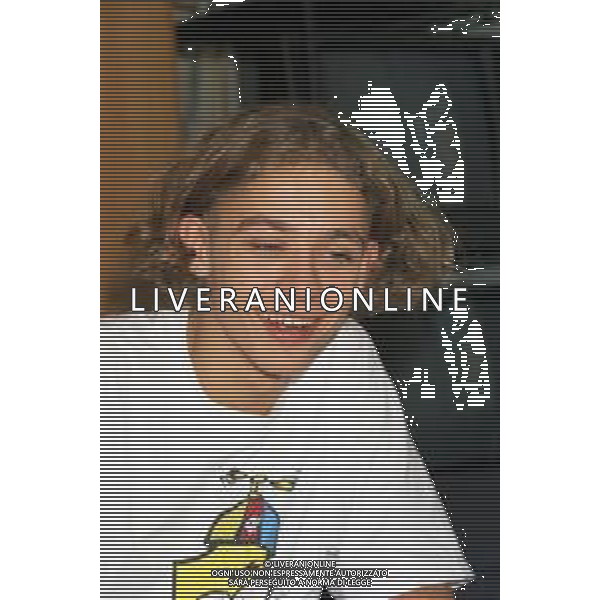 01-09-1997 MILANO REDAZIONE DELLA GAZZETTA DELLO SPORT IN VIA SOLFERINO 28 VISITA DEL CAMPIONE DI MOTOCICLISMO VALENTINO ROSSI NELLA FOTO VALENTINO ROSSI  AG ALDO LIVERANI SAS