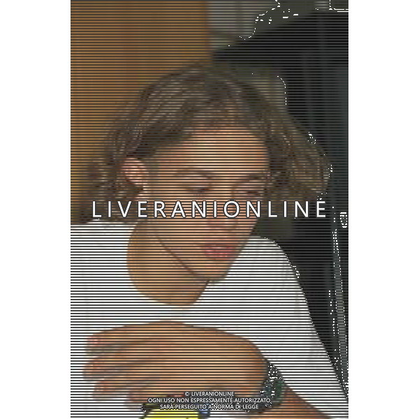 01-09-1997 MILANO REDAZIONE DELLA GAZZETTA DELLO SPORT IN VIA SOLFERINO 28 VISITA DEL CAMPIONE DI MOTOCICLISMO VALENTINO ROSSI NELLA FOTO VALENTINO ROSSI  AG ALDO LIVERANI SAS  